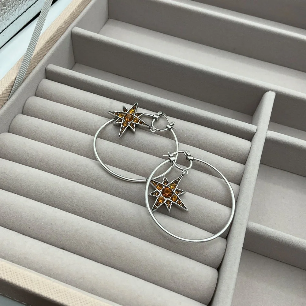 silver hoop earrings with amber stars